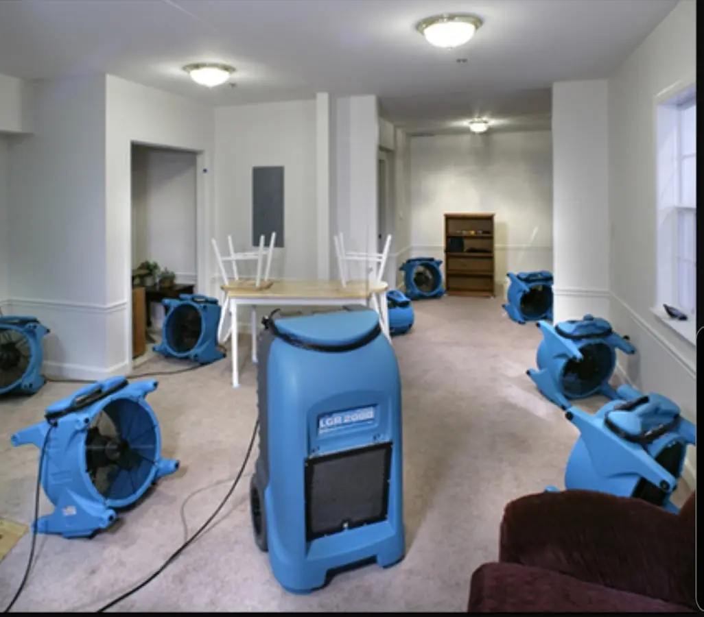 Air movers and dehumidifier setup for Water Damage Restoration in Charleston